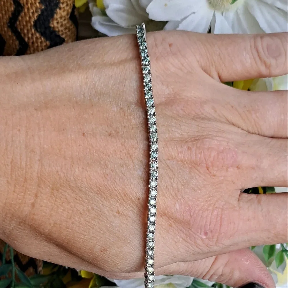 Genuine Blue Moissanite Tennis Bracelet In 925 Sterling Silver.